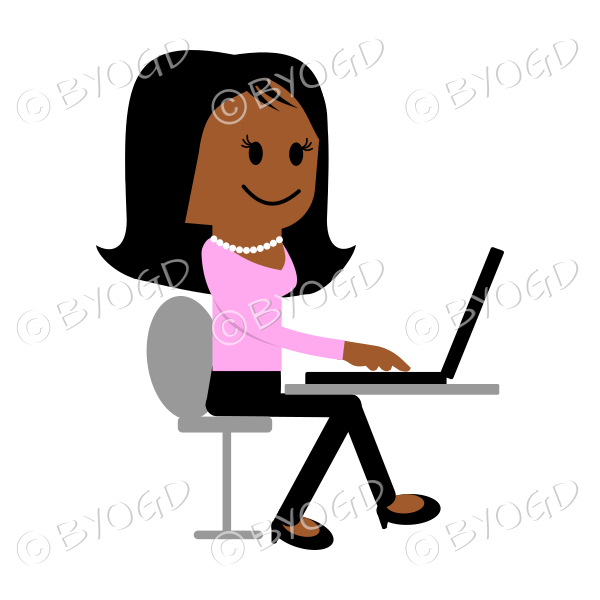 Girl in pink sitting at laptop computer