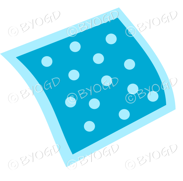 A blue napkin or pillow with polka dots