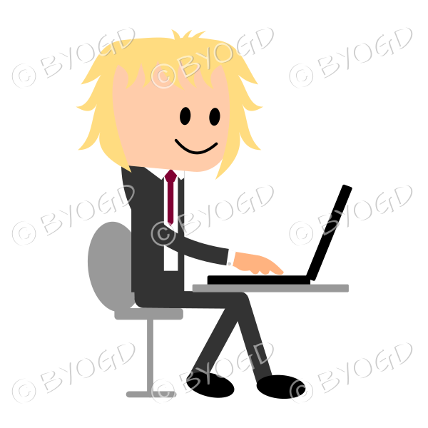 Man in a business suit. He is sitting at laptop computer