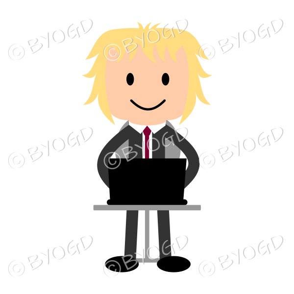 Young man in a business suit at laptop computer.